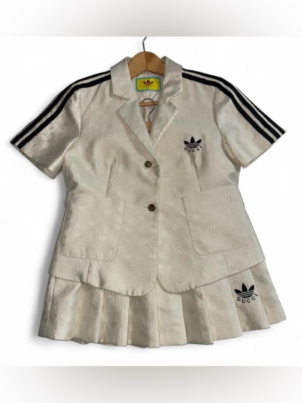 Adidas x Gucci: cream pleated skirt and blazer set